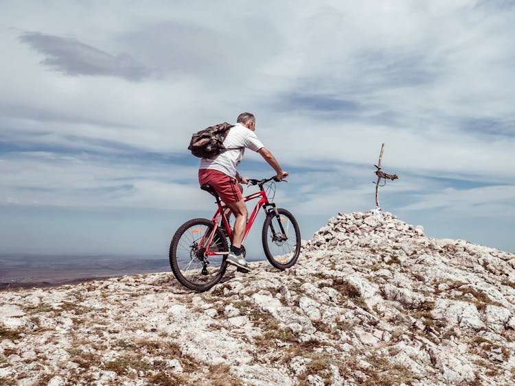 Man Riding Bicycle On Off-road