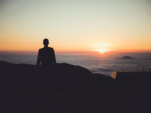 Free Silhouette of Person during Dawn Stock Photo