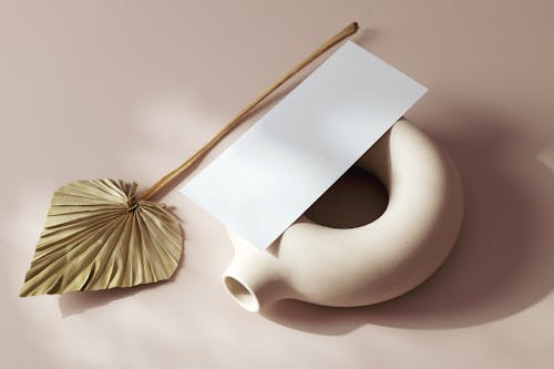 Blank Paper on Ceramic Vase