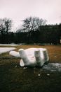 White Concrete Statue on Brown Grass Field