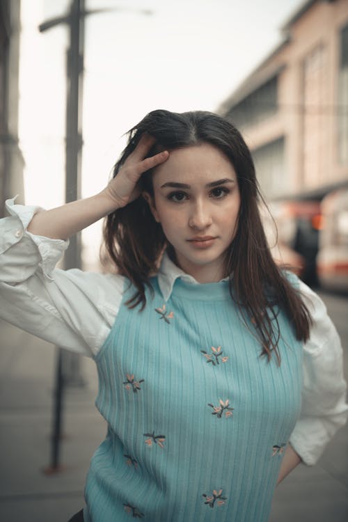 Portrait of Attractive Girl Standing in Street