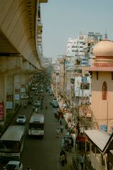 Busy urban street with traffic and people in Hyderabad