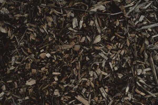 Fresh mulch ready for garden bed installation