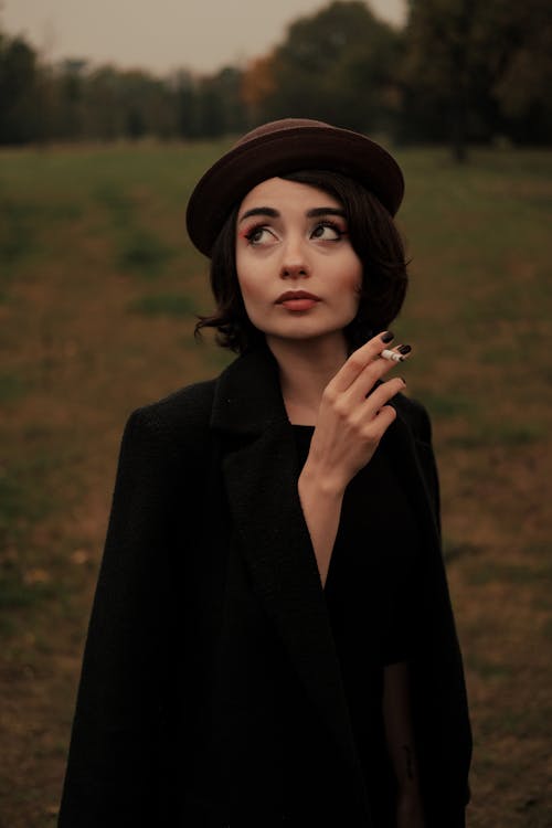 Stylish Woman Smoking a Cigarette