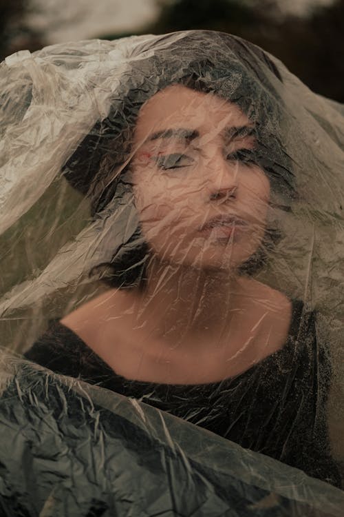 A Woman Covered with Plastic