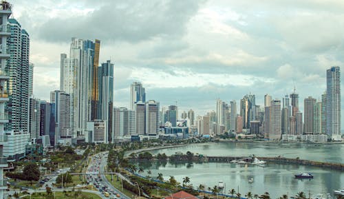 Aerial Shot of City Buildings Under the Cloudy Sky 