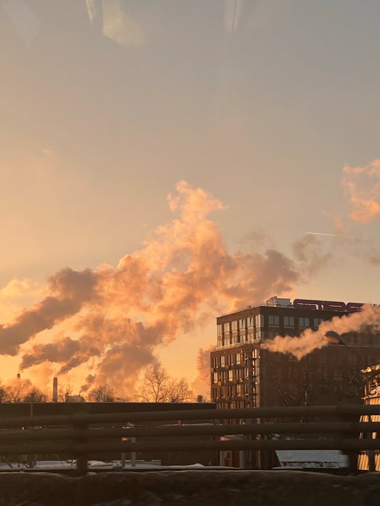 Smoke From Factory Chimneys On Sky