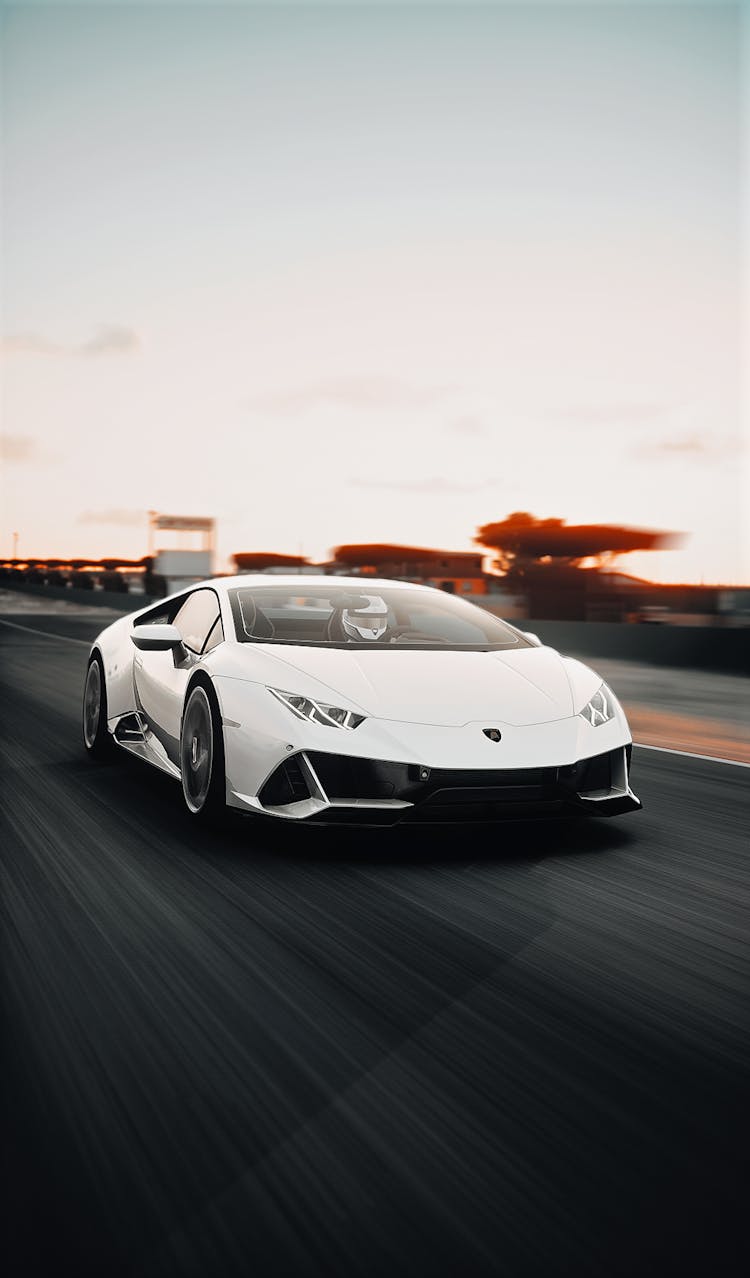 White Car On Gray Asphalt Road