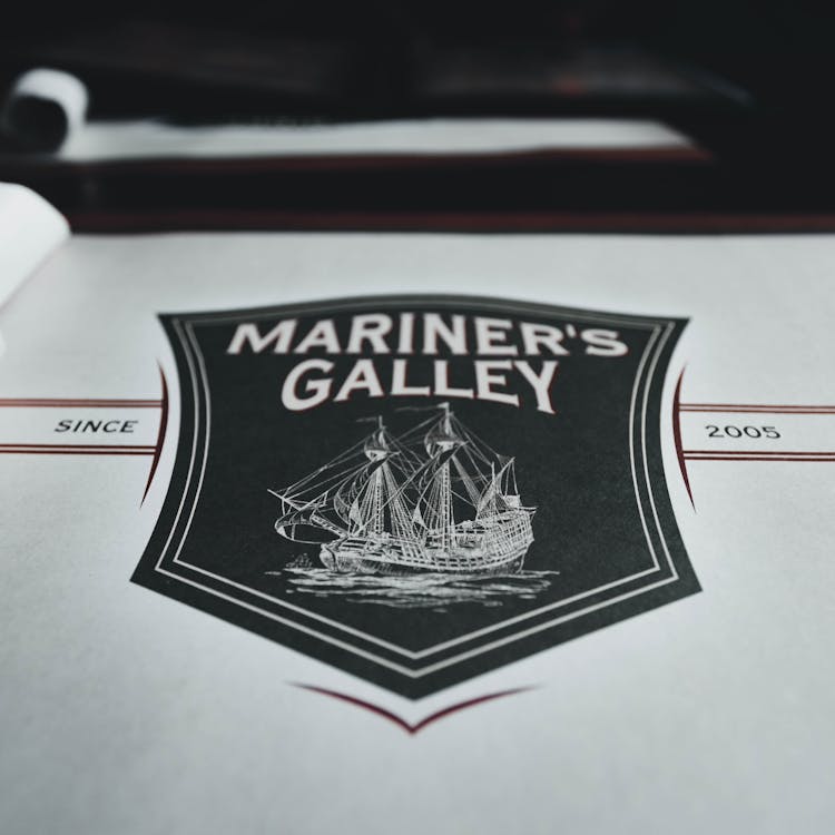 The Mariner's Gallery Restaurant Logo In Close-up Shot