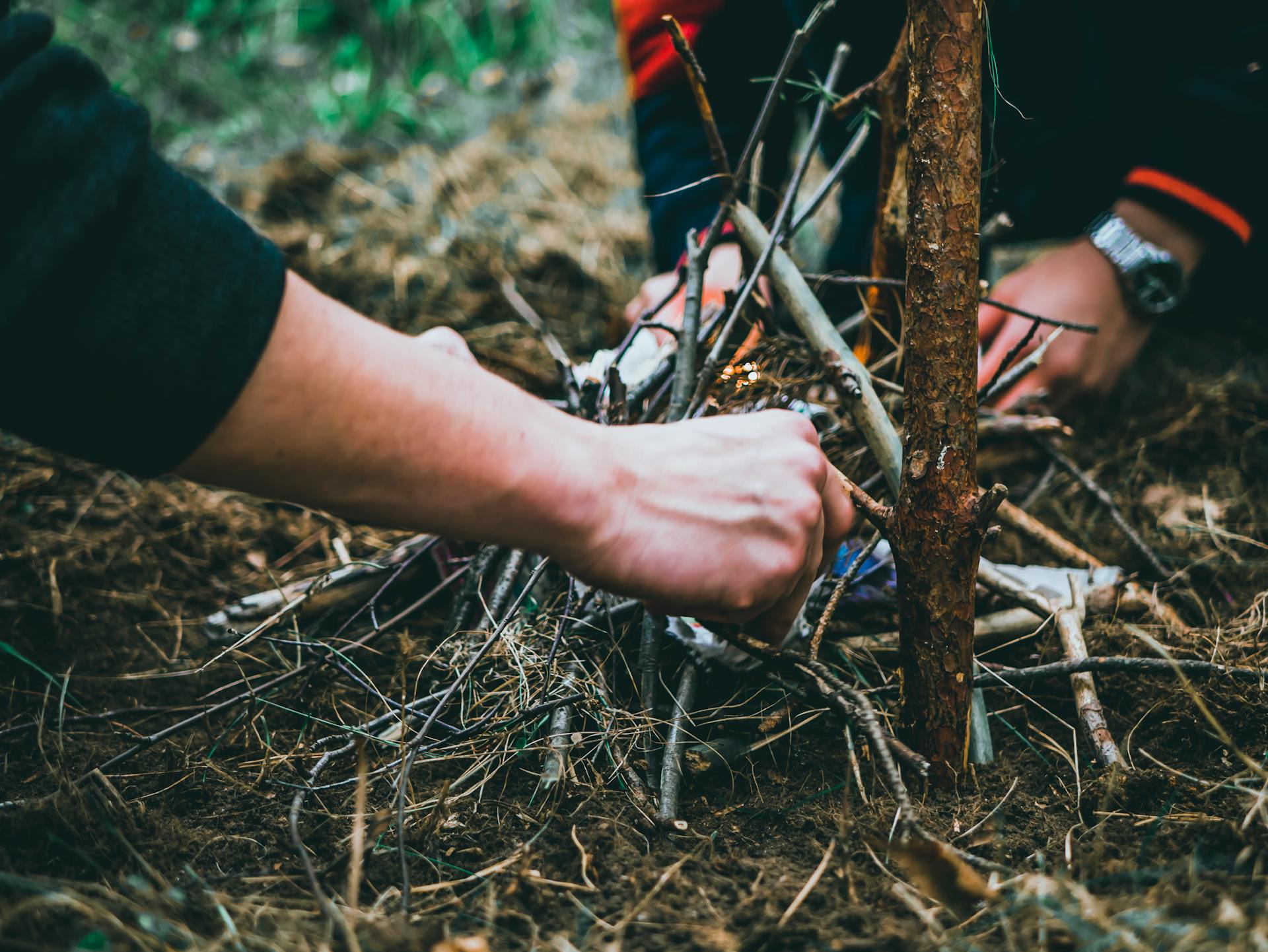 Two People Making fire