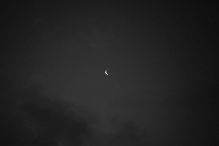 Crescent Moon On Dark Sky