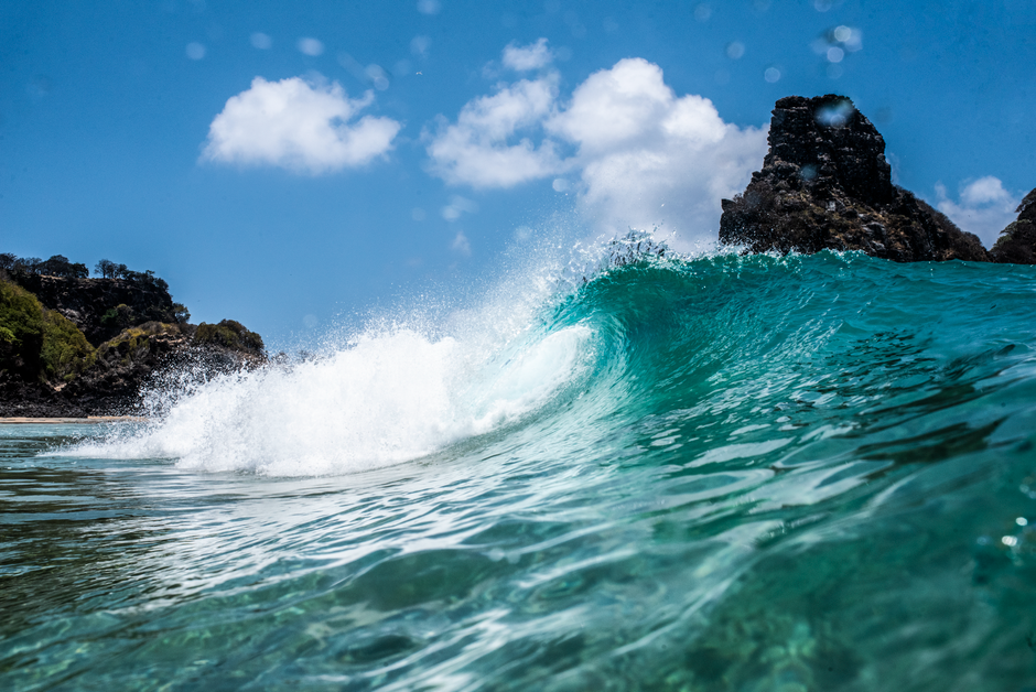 Stunning wave crashing on protected Brazil beach, capturing dynamic ocean energy and beauty.