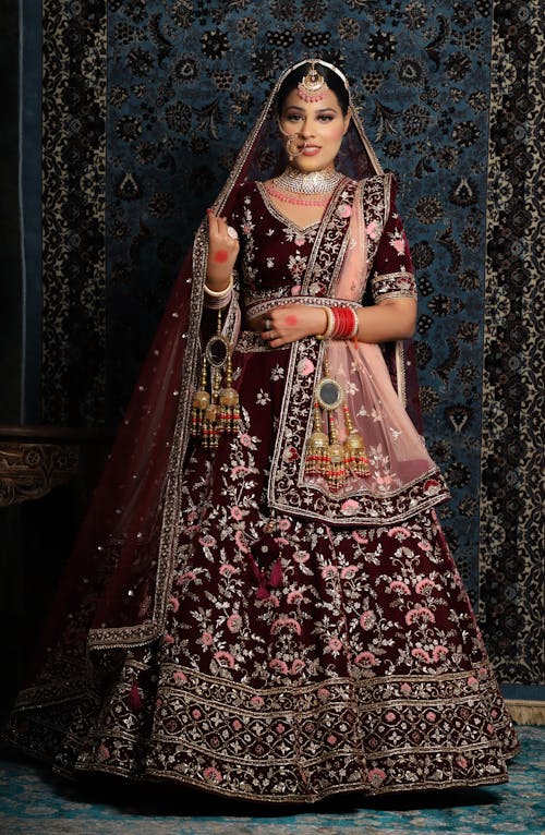 Woman Wearing a Maroon Sari