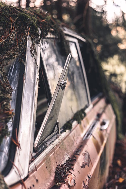 Close-up Photo of a Dirty Abandoned Car