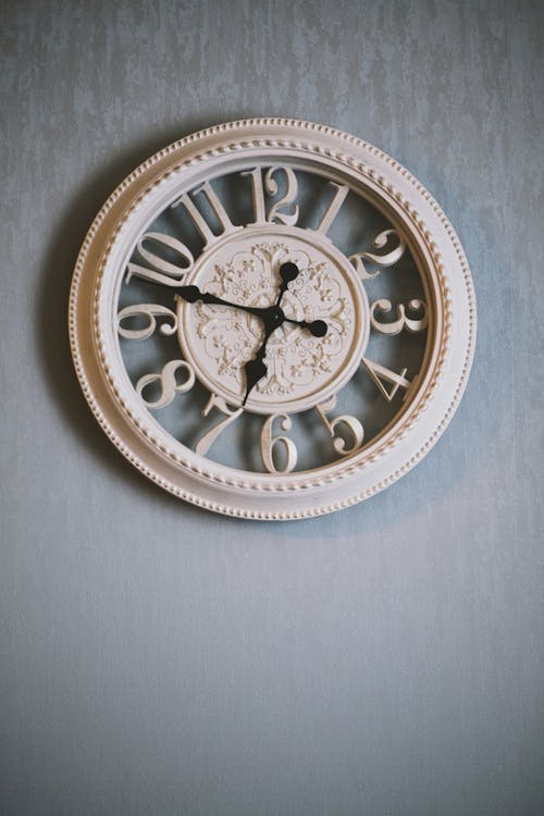 Free Round White Analog Clock Showing Time Stock Photo
