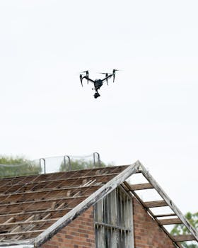 Aerial drone flying over a weathered rooftop in Sydney, capturing unique architectural views.