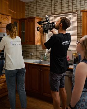 Film crew captures cinematic moments in a Sydney kitchen setting. Discover the art of filmmaking indoors.