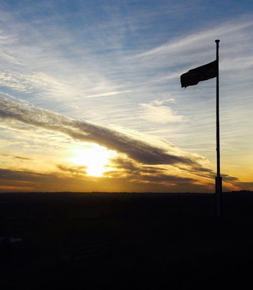 Free stock photo of castle hill, flag, sunset