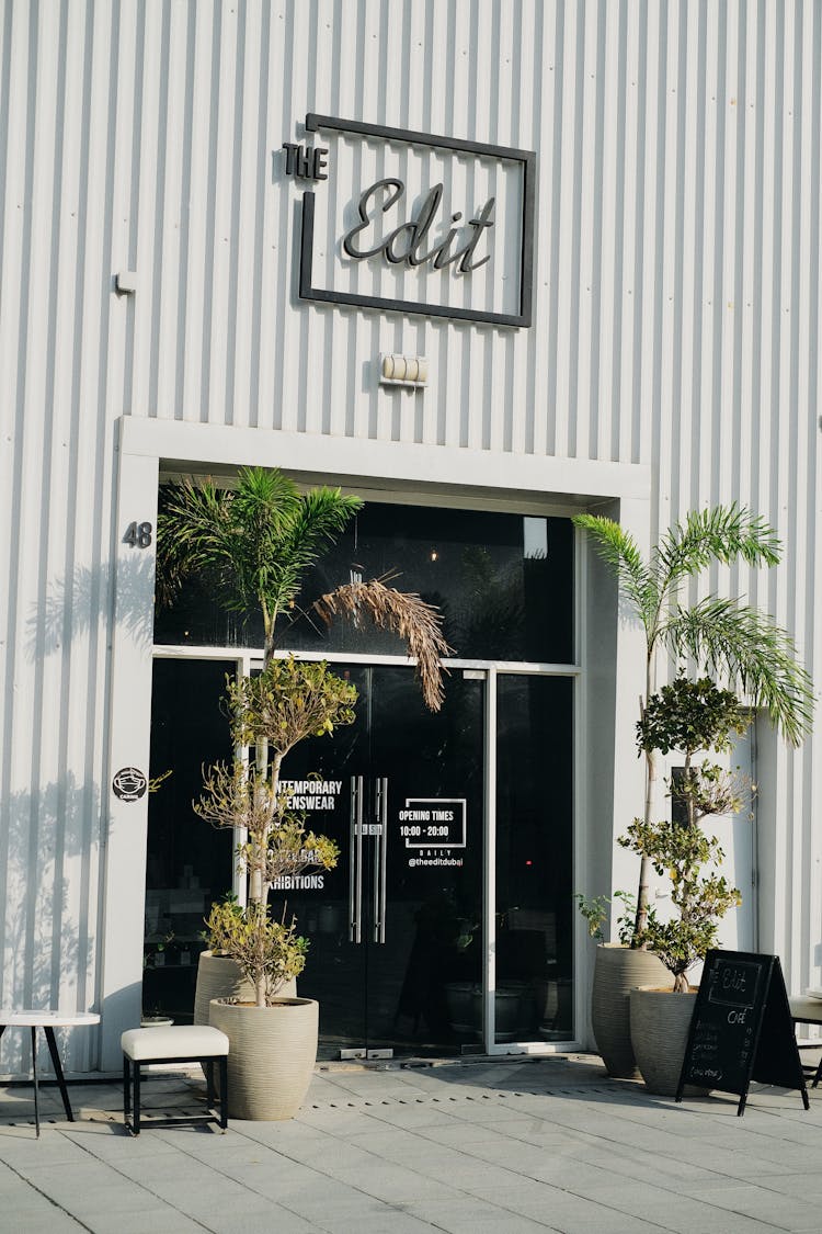 The Edit Signage On Exterior Steel Wall Of A Building