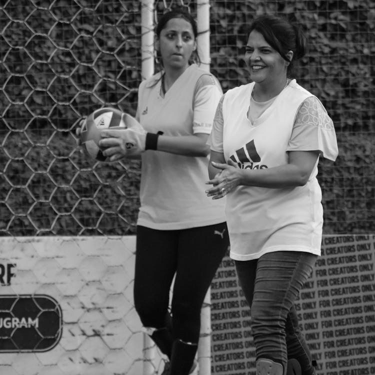 Two Women Playing Soccer 