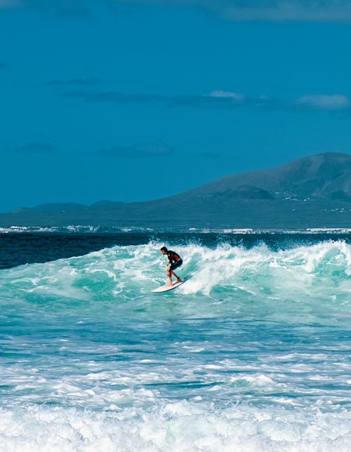 Foto d'estoc gratuïta de , aigua, fent surf