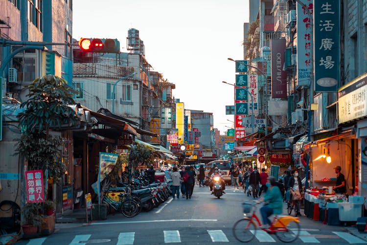 People In A Busy Street Of A Marketplace 