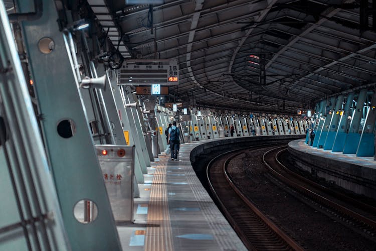 People Waiting At Subway Station