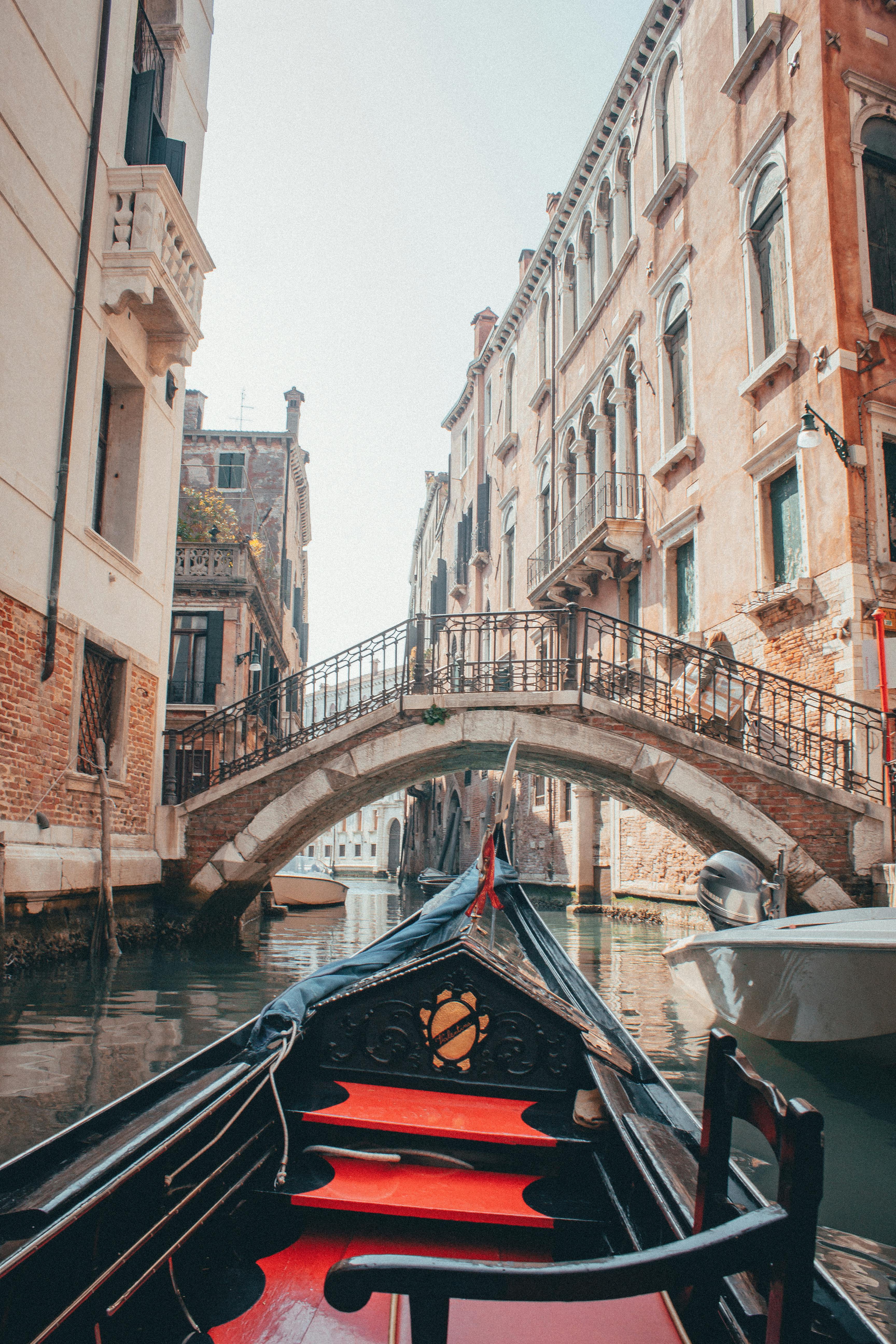 Gondola and Motorboats on Canal in Venice · Free Stock Photo