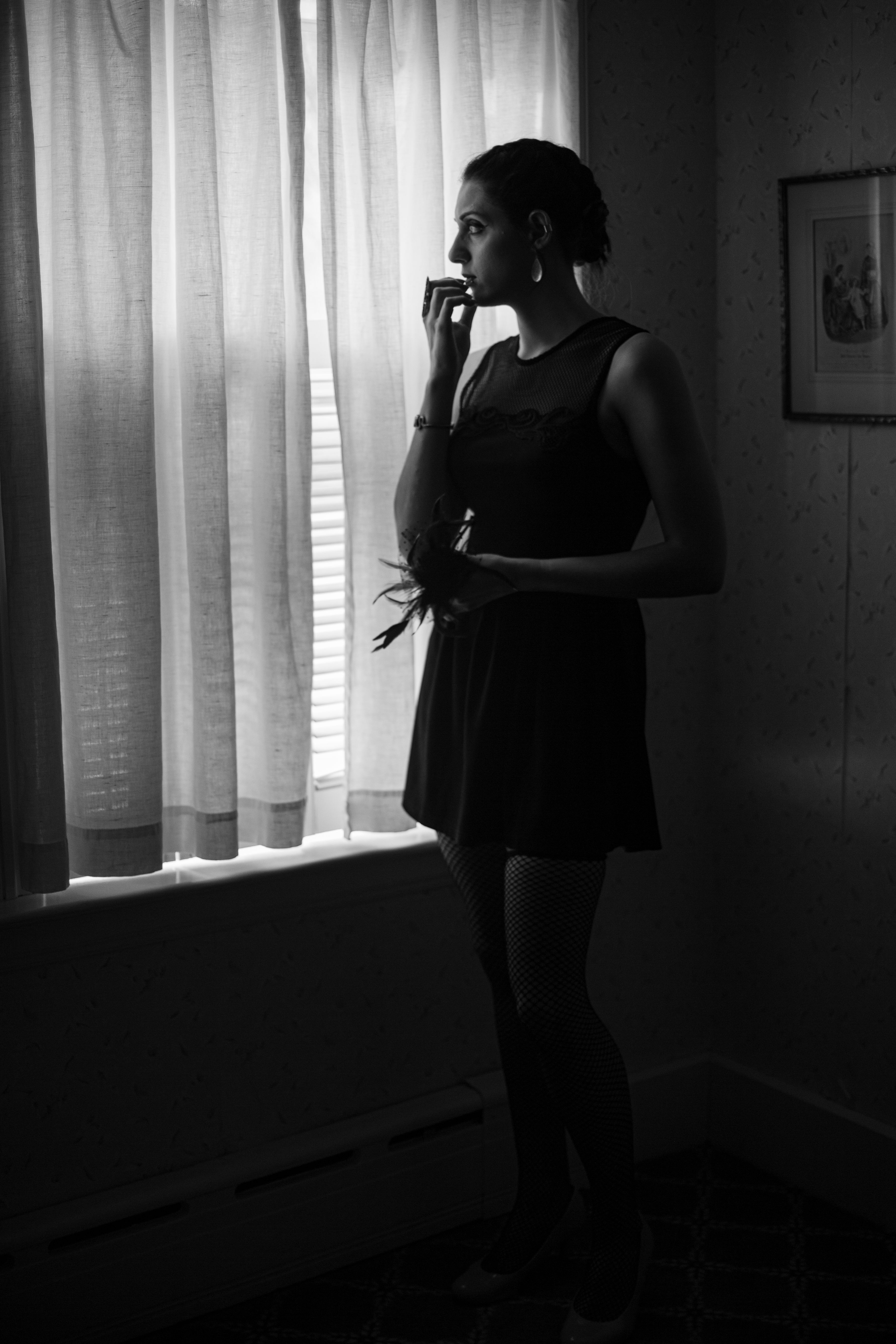Grayscale Photo of a Woman in a Black Dress · Free Stock Photo