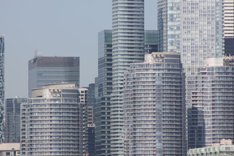 Panoramic view of modern skyscrapers showcasing urban architecture.