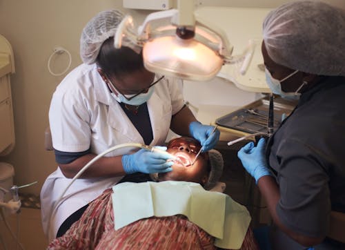 A Man Getting a Dental Treatment