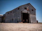 An Abandoned Building under Blue Sky