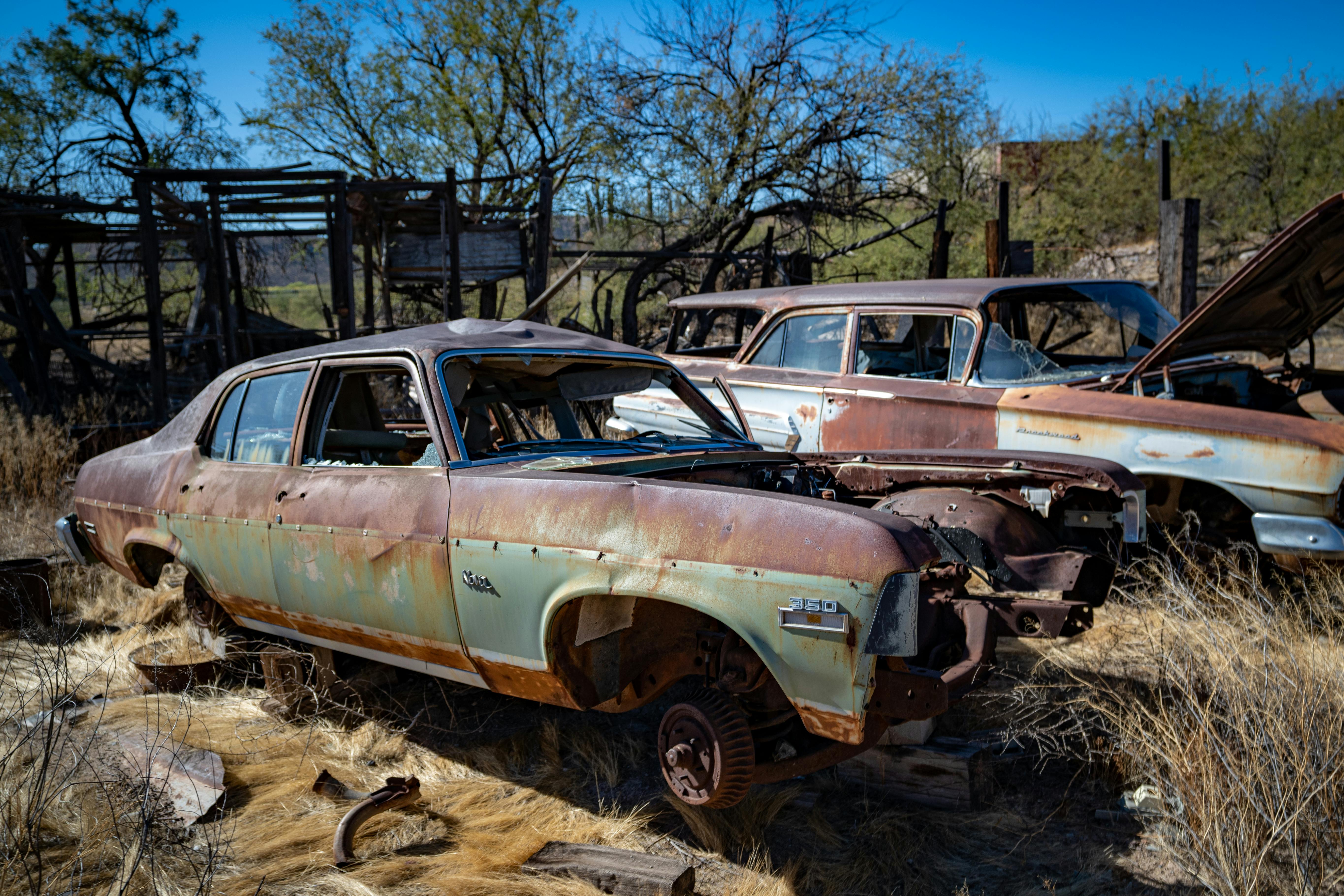 Abandoned Cars on a Junkyard Free Stock Photo