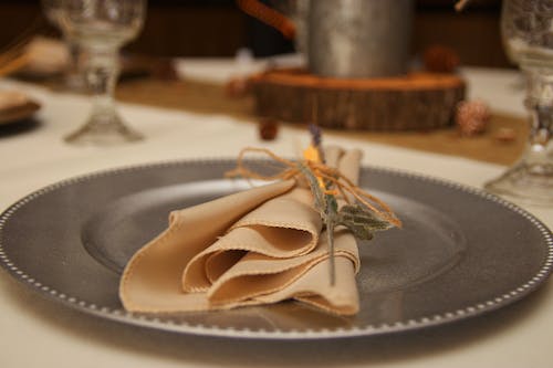 Arranged Napkin on a Silver Plate 
