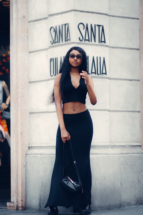 Stylish Woman in Black Crop Top and Black Sunglasses