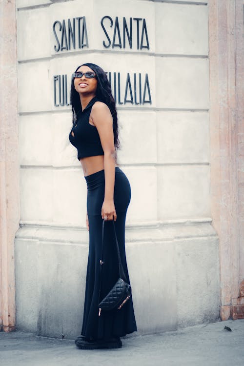 Stylish Woman in Black Crop Top and Black Sunglasses