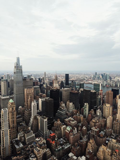 Free Stunning aerial shot of New York City's iconic skyline with skyscrapers and high-rises. Stock Photo