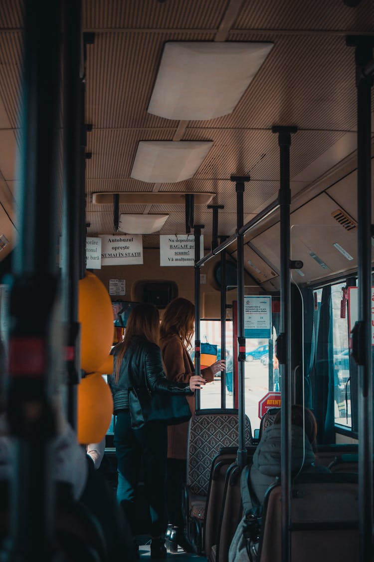 Women Getting Out The Bus 