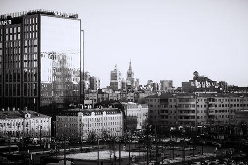 Free Black-and-white view of a city skyline featuring historical and modern architecture. Stock Photo