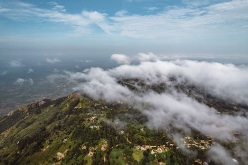 Aerial Photography of Cloudy Mountains under the Sky