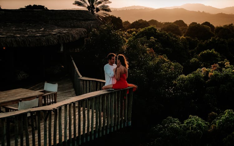 Couple On A Wooden Viewing Deck 