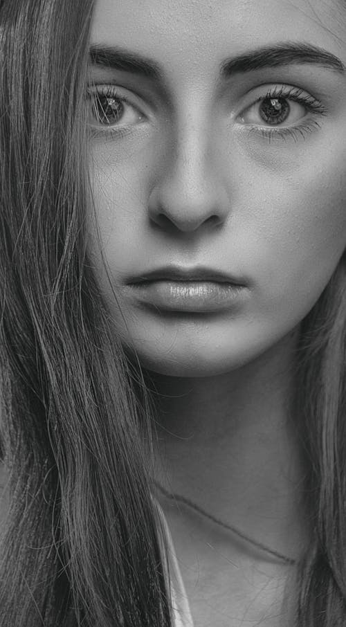 Free Grayscale Photo of a Woman Staring Stock Photo