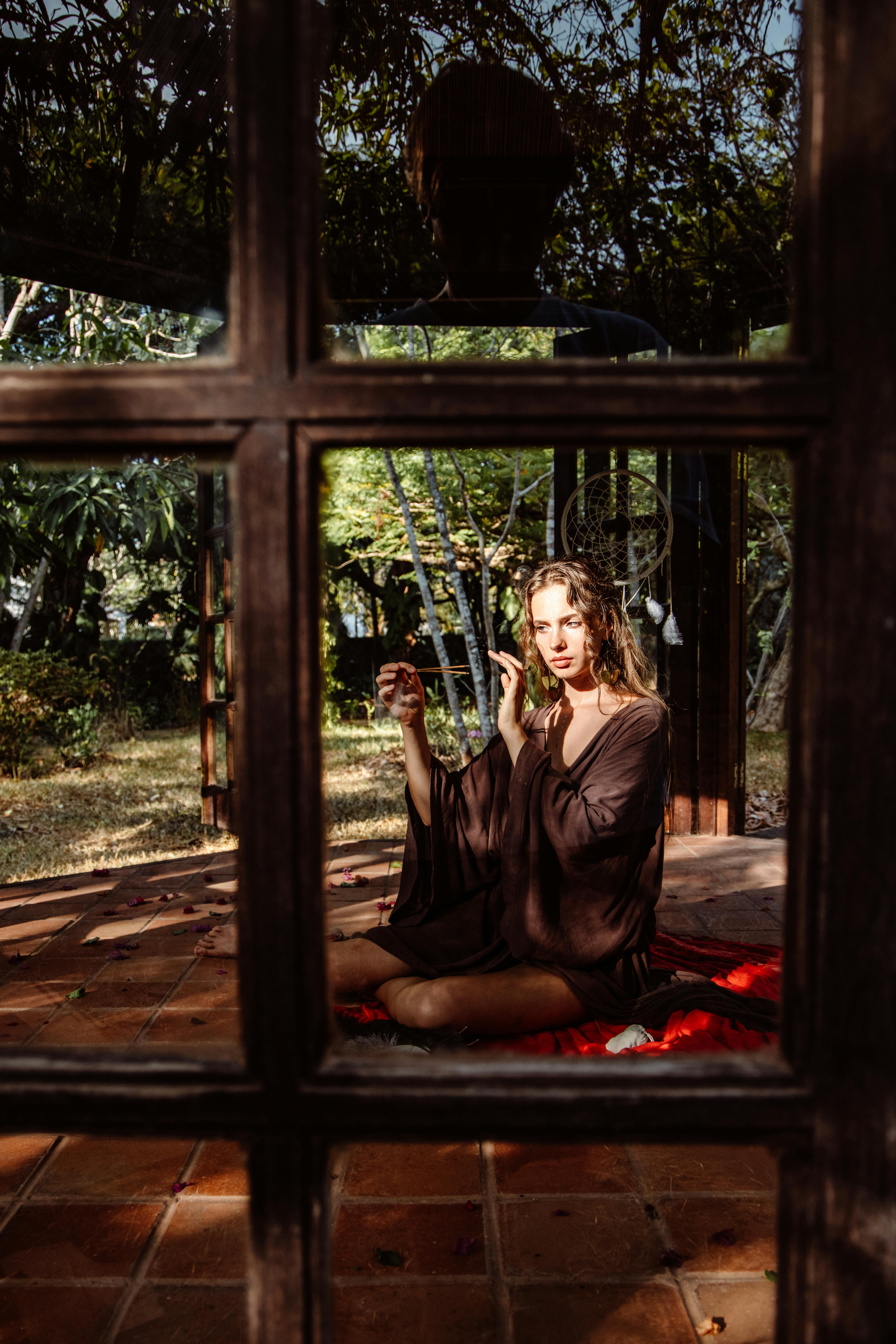 young woman sitting on the terrace