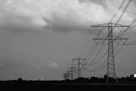 Gray Steel Electric Posts Under Gray Sky