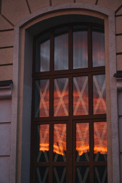 Reflection of the Sky at Sunset on a Window