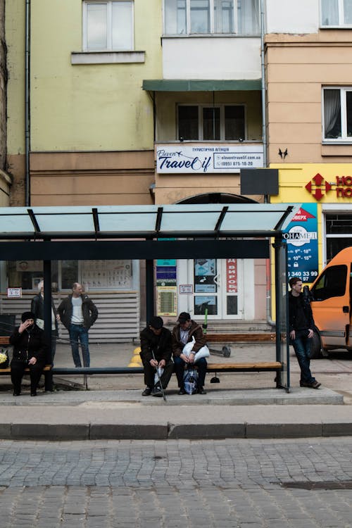 Elderly People Sitting on the Waiting Shed