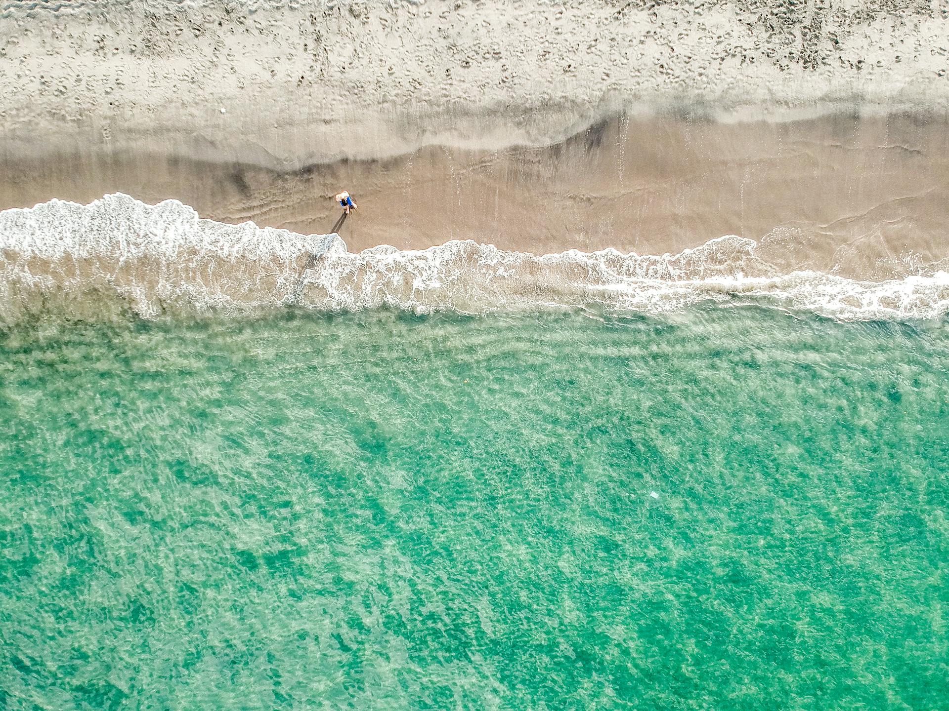 Stunning aerial shot of the Philippines coast showcasing sandy shorelines and turquoise waters.