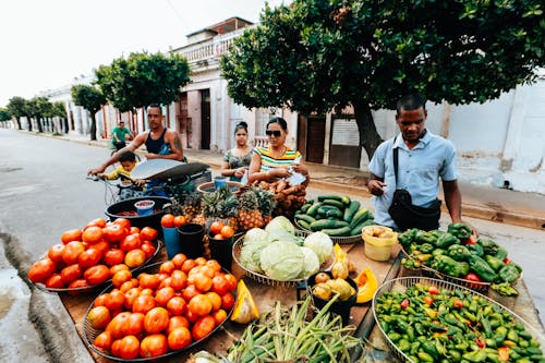 People Selling Fresh Fruit and Vegetables on the Street