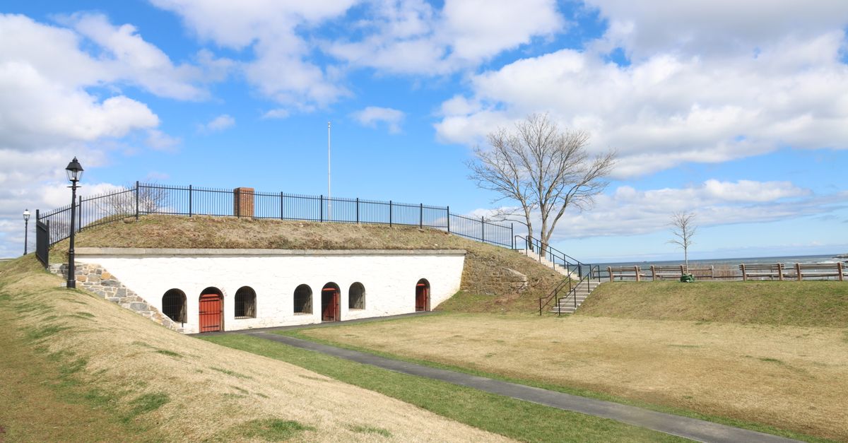 Scenic view of a historic fort under a vibrant blue sky in Marblehead, Massachusetts.