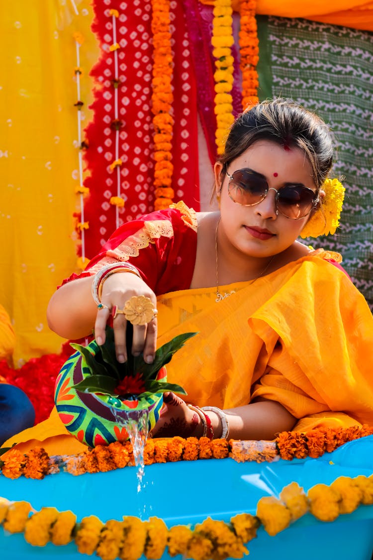 Indian Woman With Pot Plant